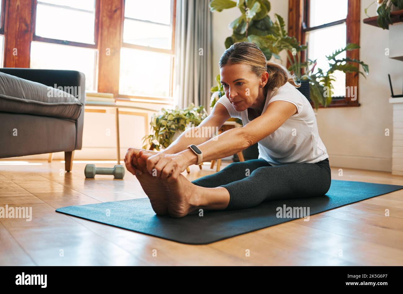 Yoga Stretching Woman Living Room Floor Training Exercise Mental Health  Stock Photo by ©PeopleImages.com 663629404