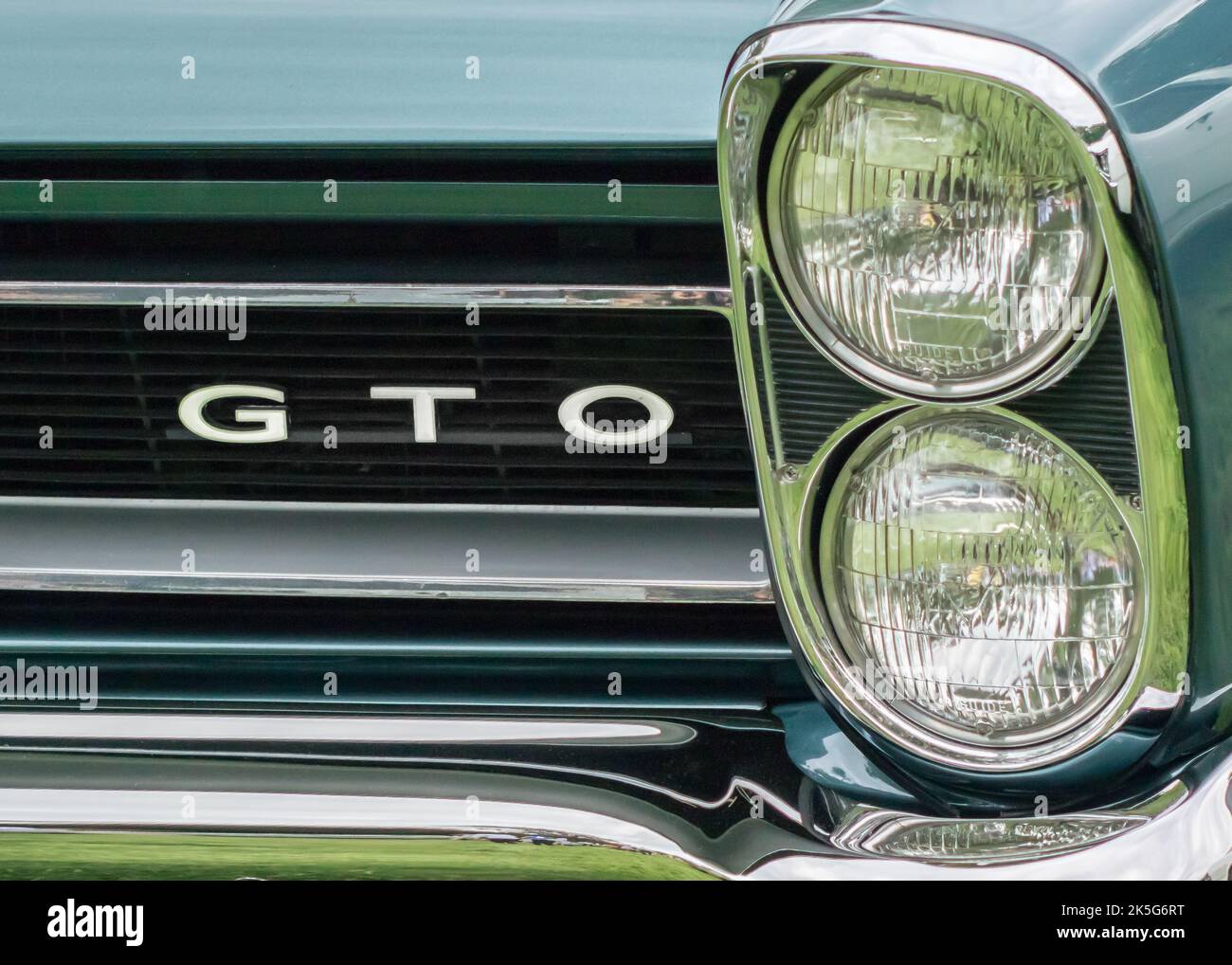 GROSSE POINTE SHORES, MI/USA - JUNE 21, 2015: A 1965 Pontiac GTO grille, EyesOn Design car show, Edsel & Eleanor Ford House, near Detroit, Michigan. Stock Photo