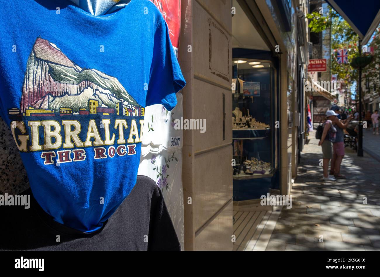Gibraltar. 5th September 2022. Close up of blue t-shirt on display outside a souvenir shop in Main Street, Gibraltar. Stock Photo