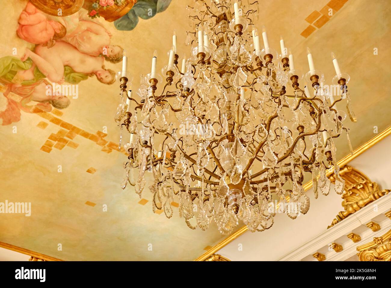 Ceiling painting and chandelier, Neues Palais (New Palace), Sanssouci Park, Potsdam, Brandenburg, Germany, status August 6, 2021. Stock Photo