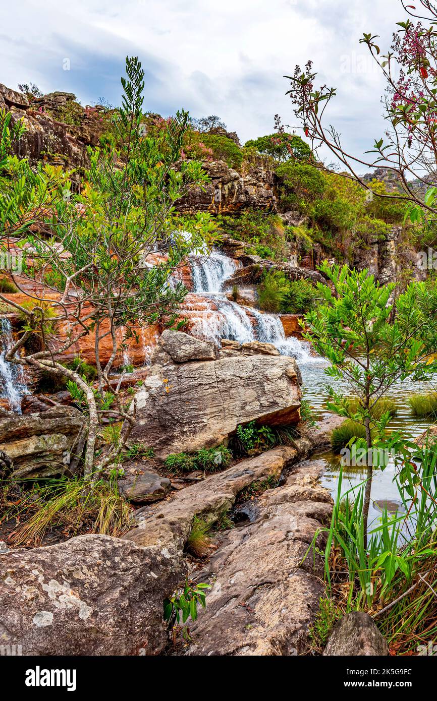 Set of clear water cascades among the rocks and native vegetation of the Biribiri environmental reserve in Diamantina, Minas Gerais, Brazil Stock Photo