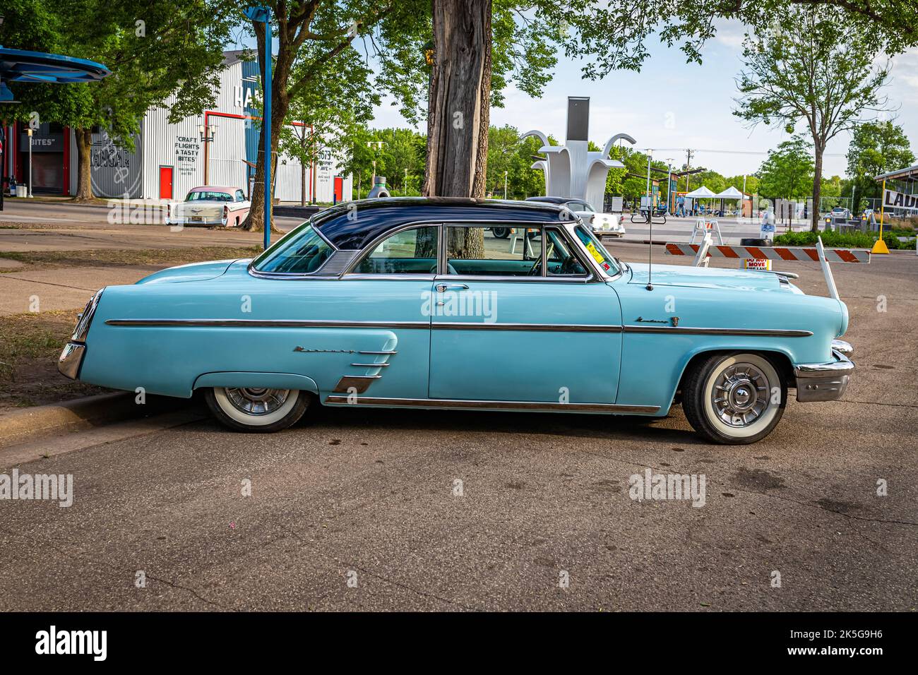 Falcon Heights, MN - June 19, 2022: High perspective side view of a 1953 Mercury Monterey Hardtop Coupe at a local car show. Stock Photo
