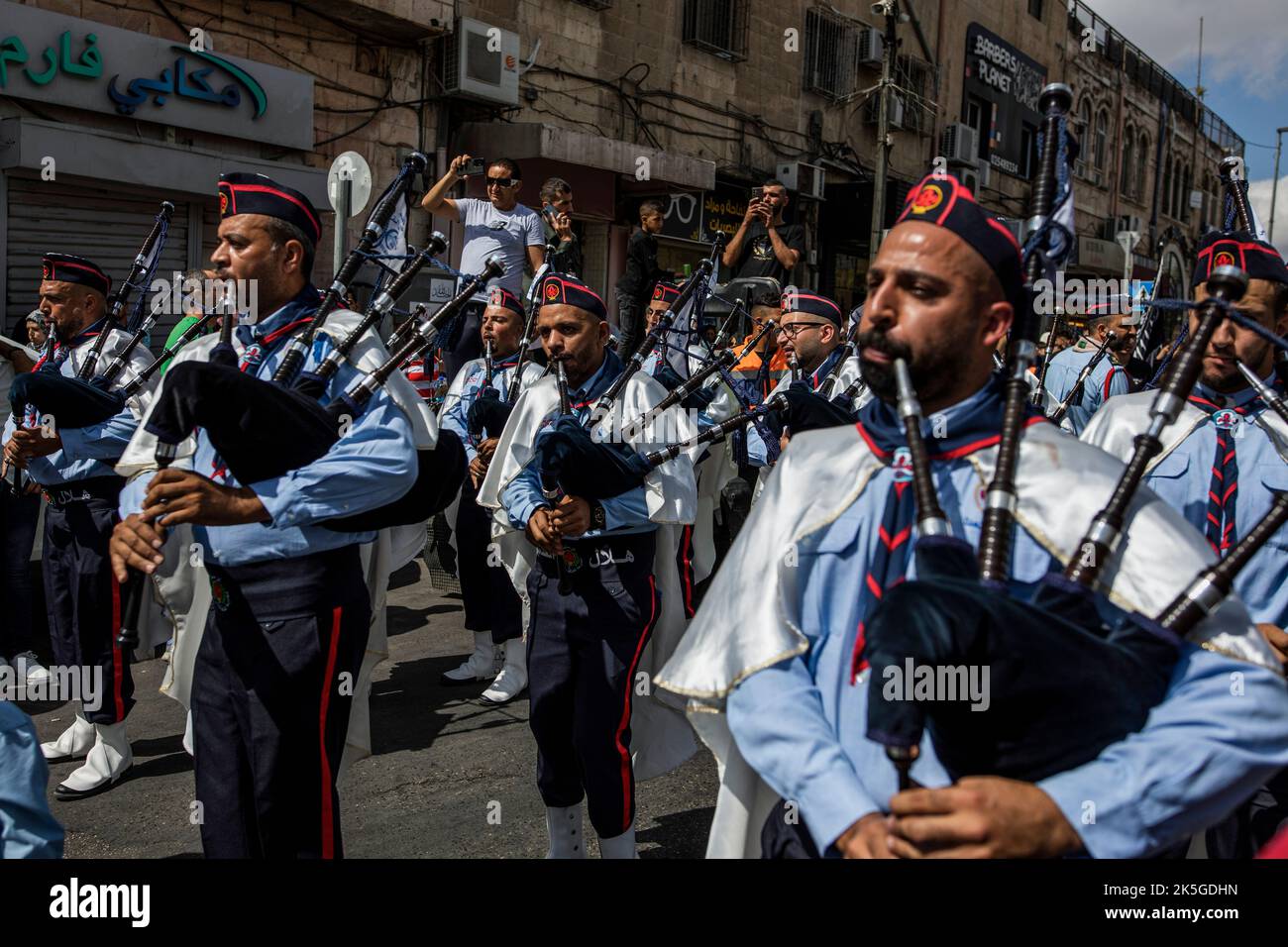 Jerusalem, Israel. 08th Oct, 2022. Palestinian scouts play their musical instruments during a parade organized to mark 'Mawlid', the birthday of Islam's Prophet Muhammad. Credit: Ilia Yefimovich/dpa/Alamy Live News Stock Photo