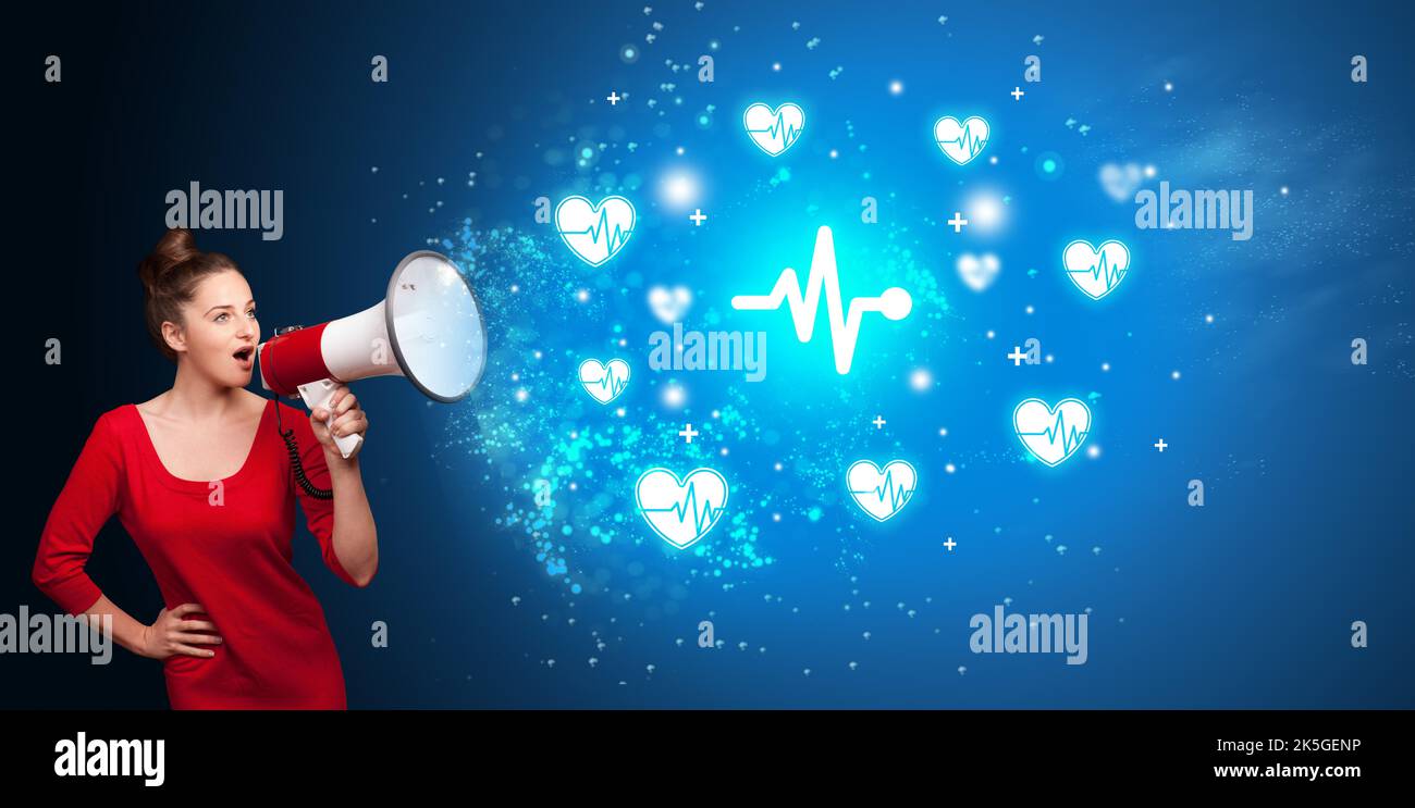 Young person with megaphone and healthcare icon Stock Photo - Alamy