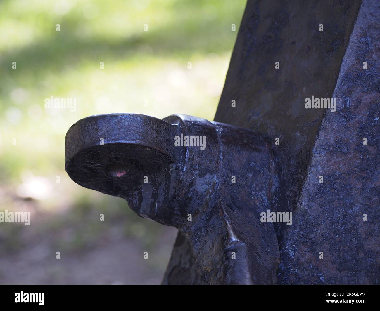rusted anchor bolt in a public park. Travel and tourism concept Stock Photo