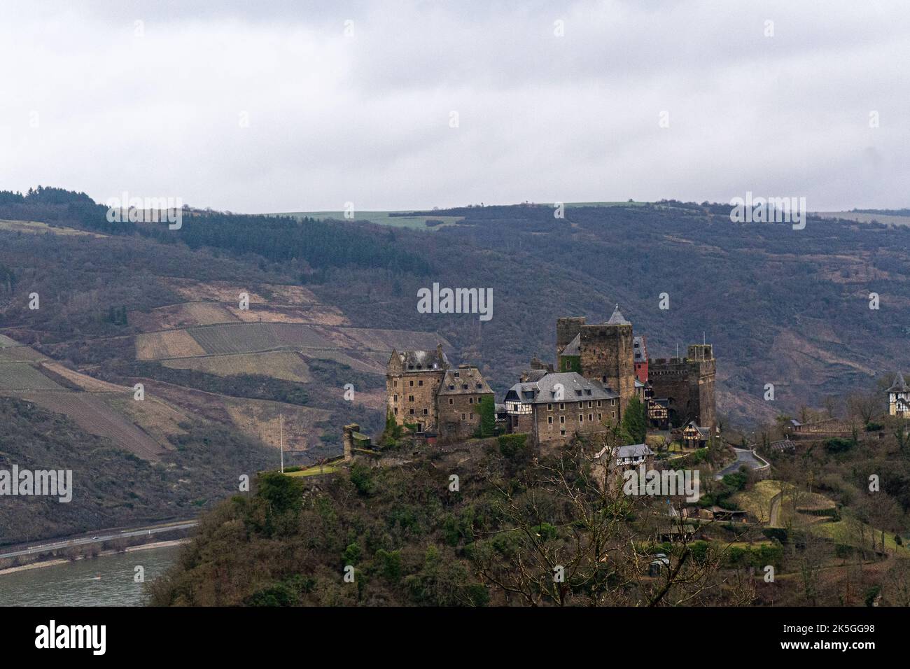 A medieval castle on a hill on a natural background Stock Photo - Alamy