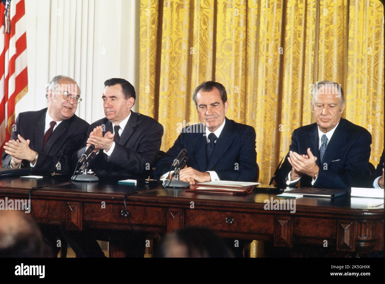 United States President Richard M. Nixon, second right, makes remarks during a signing ceremony for the instruments of ratification of the SALT agreements between the Union of Soviet Socialist Republics (USSR) and the United States in the East Room of the White House in Washington, DC on October 3, 1972. Pictured from left to right: Soviet Ambassador Anatoly F. Dobrynin, Soviet Foreign Minister Andrei Gromyko, President Nixon, and US Secretary of State William P. Rogers. The agreements intend to restrain the growth of the nuclear arsenals of both nations. Credit: Arnie Sachs / CNP Stock Photo