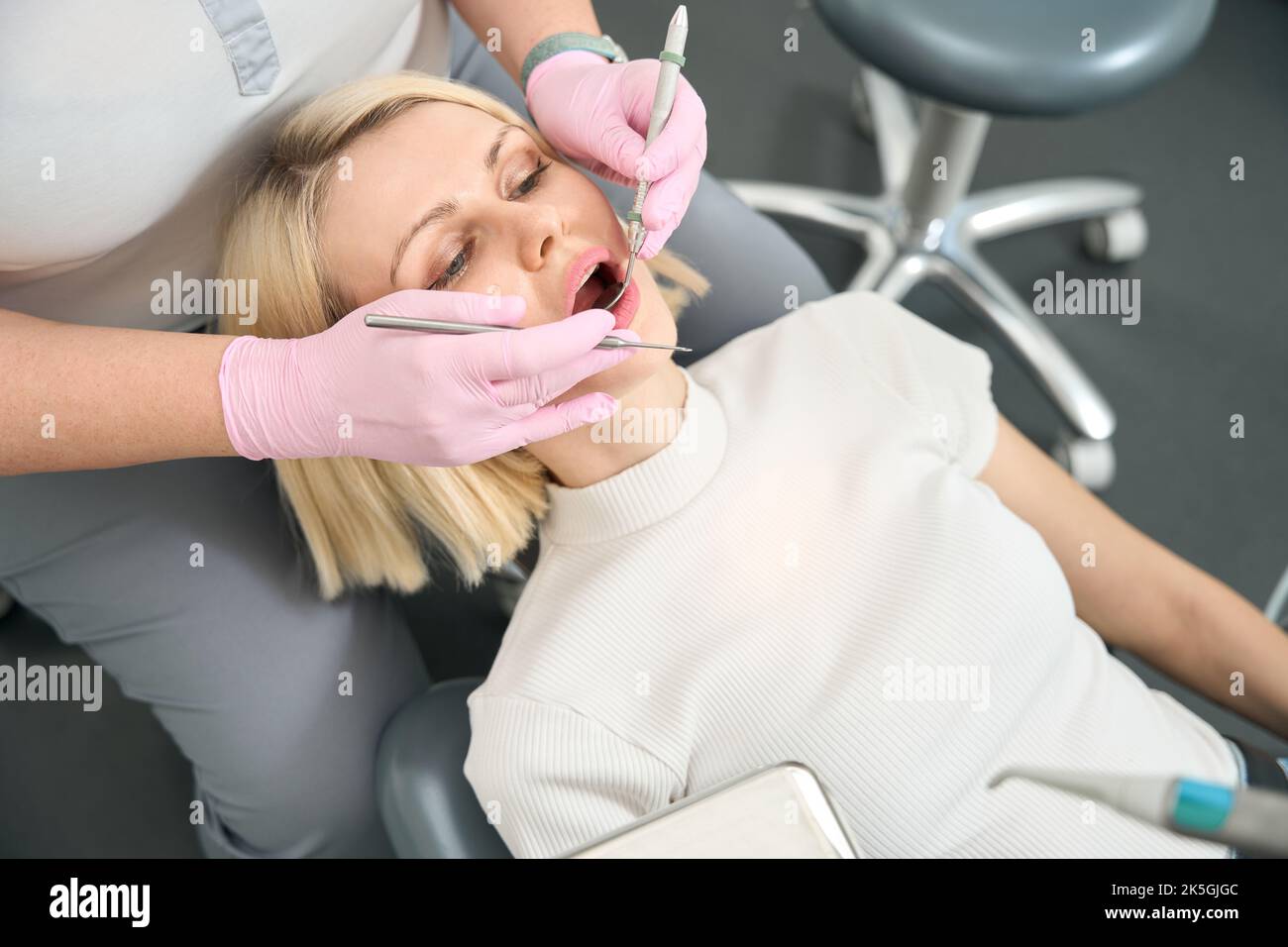 Lady sits in chair hi-res stock photography and images - Alamy