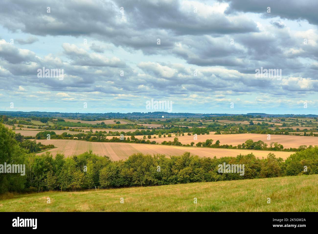 A scenic view from the Chiltern hills looking towards an open field on ...