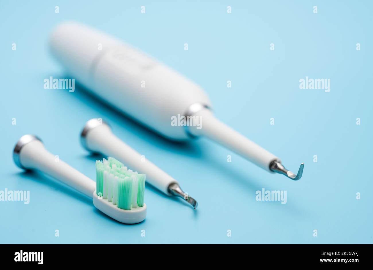 Electric ultrasonic toothbrush to remove dental calculus Stock Photo
