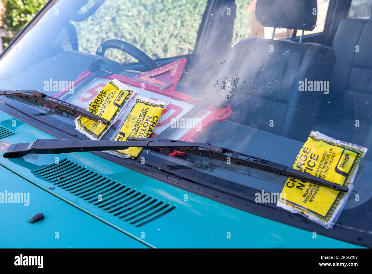 Slough, Berkshire, UK. 8th October, 2022. Parking fines on a car in