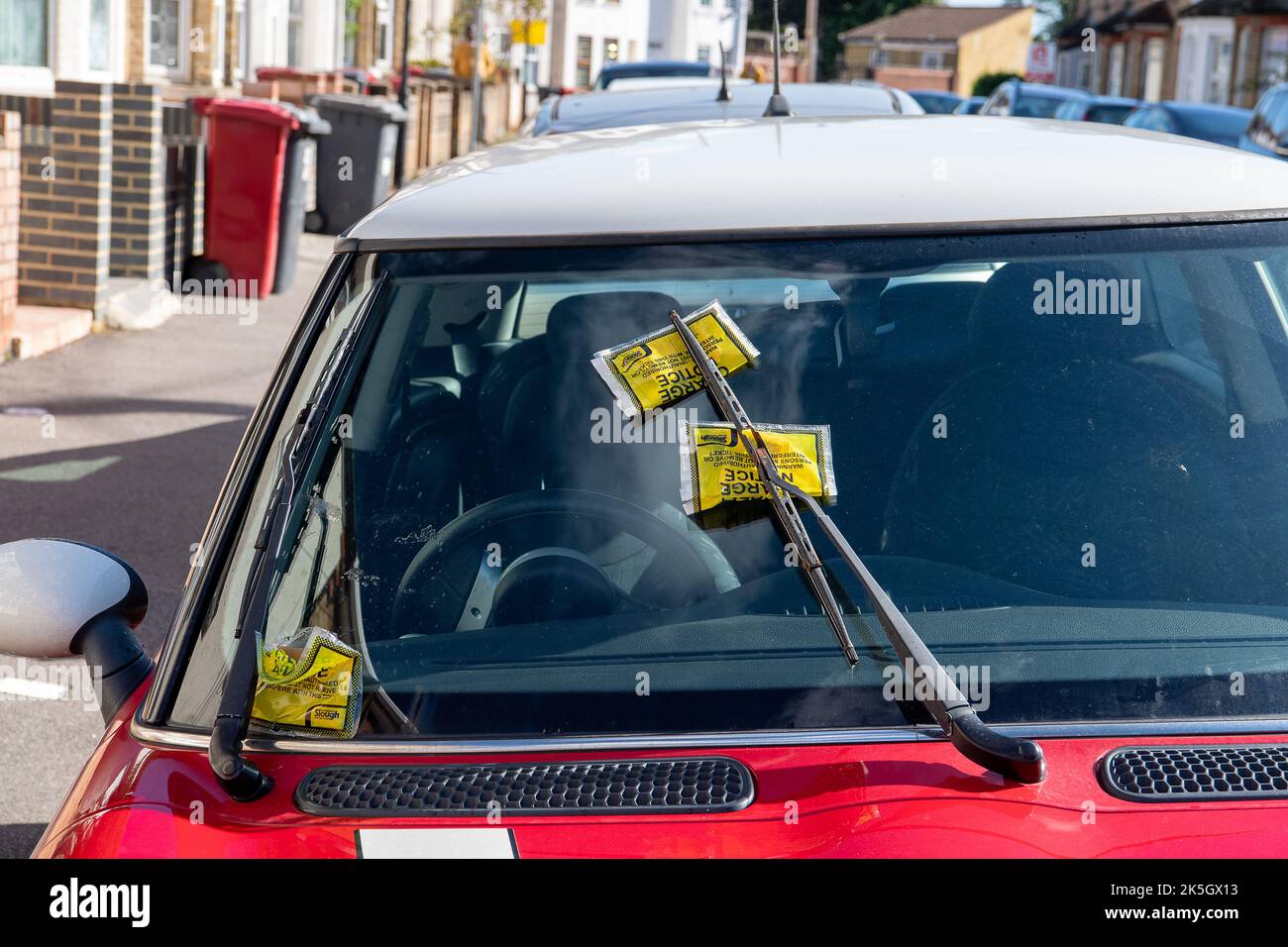 Slough, Berkshire, UK. 8th October, 2022. Parking fines on a car in