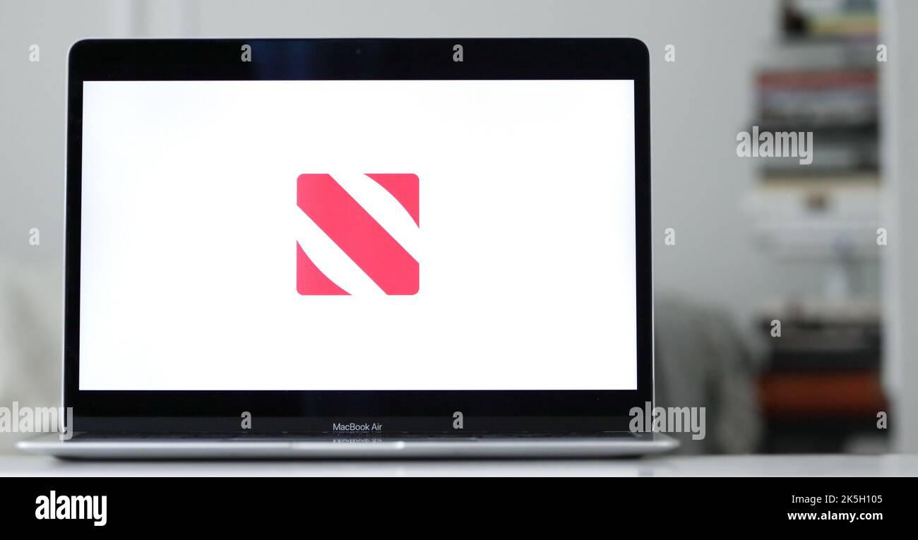 The logo of Apple News, a news aggregator app and RSS feed developed by Apple for its devices, displayed on a laptop screen Stock Photo