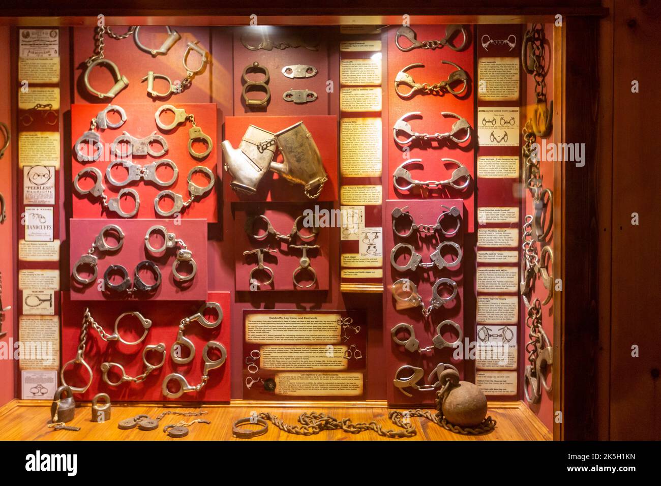Dodge City, Kansas - A display of handcuffs at the Boot Hill Museum. The museum preserves the history and culture of the old west. Located on the site Stock Photo