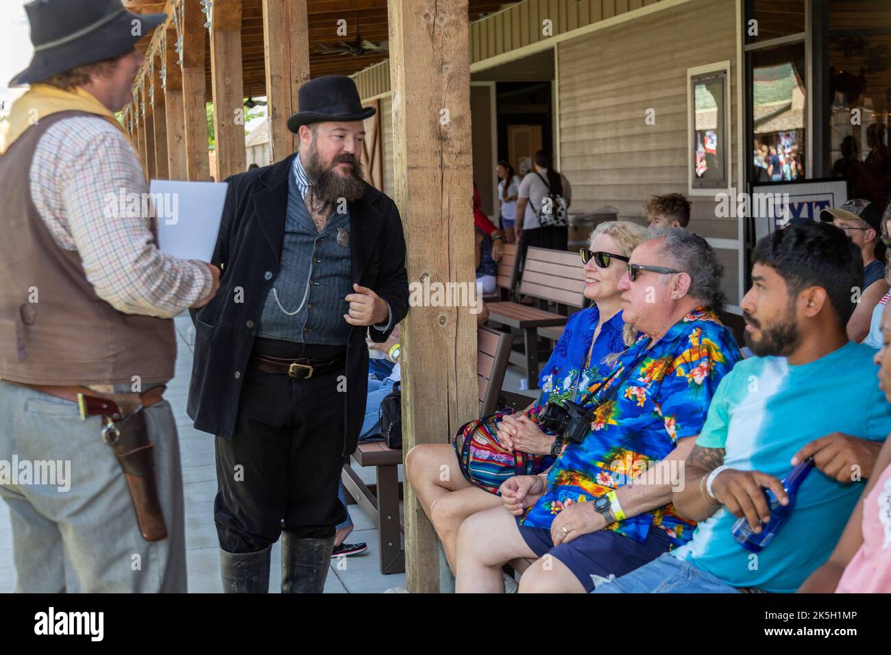 Dodge City, Kansas - An actor playing Ed Masterson talks with visitors at the Boot Hill Museum. The museum preserves the history and culture of the ol Stock Photo
