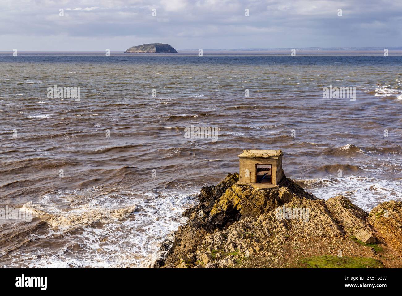 The WW II Searchlight Post on Howe Rock at Brean Down fort in the Bristol Channel, North Somerset, England Stock Photo