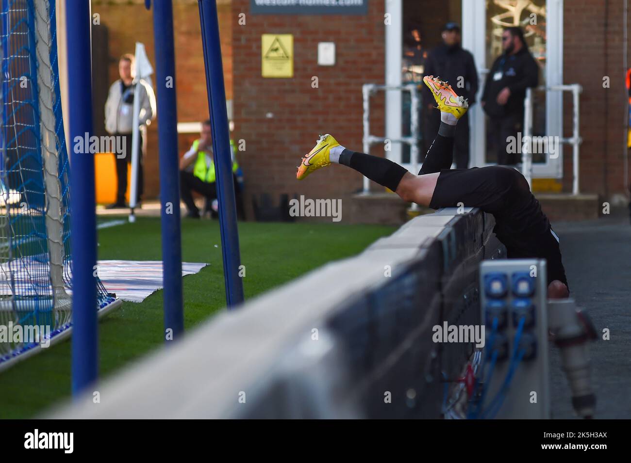 Joe Powell (7 Burton Albion) collides with advertising board during the Sky Bet League 1 match between Peterborough and Burton Albion at London Road, Peterborough on Saturday 8th October 2022. (Credit: Kevin Hodgson | MI News) Credit: MI News & Sport /Alamy Live News Stock Photo
