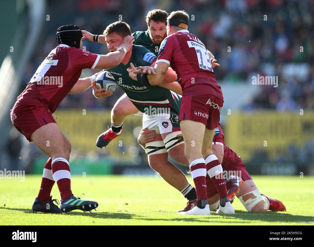 Leicester Tigers’ Jasper Wiese is tackled by Sale Sharks’ Bevan Rodd (left), Sam James (second right) and Jean-Luc du Preez during the Gallagher Premiership match at the Mattioli Woods Welford Road Stadium, Leicester. Picture date: Saturday October 8, 2022. Stock Photo