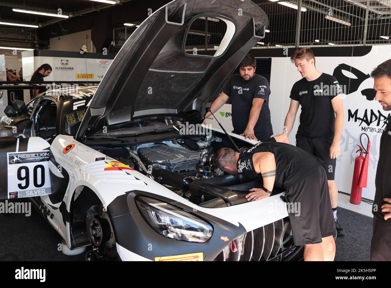 1 October 2022 - Mechanics tuning Mercedes car at Festival de Velocidad, at Circuit of Catalonia in Barcelona, Montmelo, Spain Stock Photo