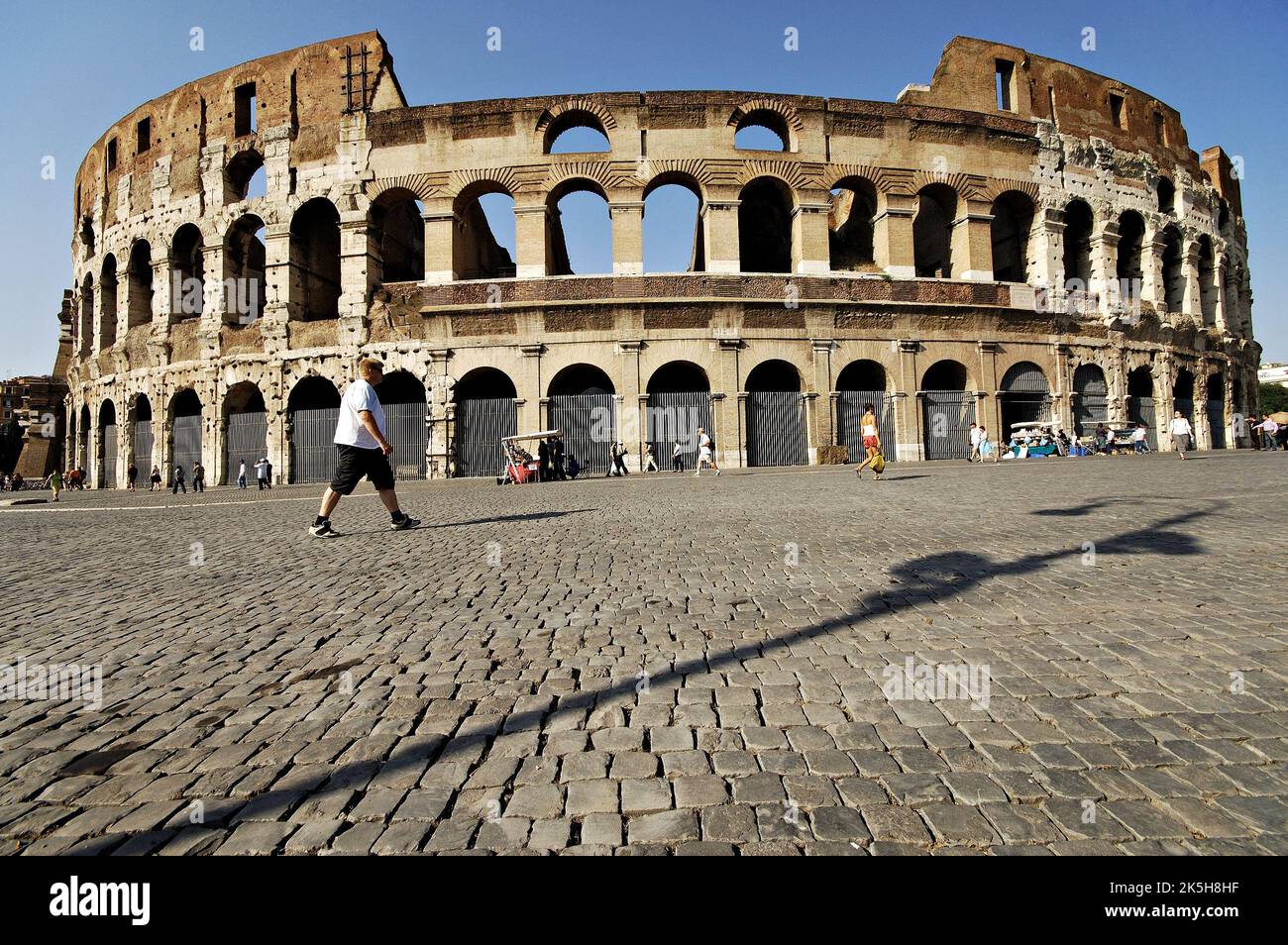 Someone Walking Rome Man walking in front colosseum hi-res stock photography and images - Alamy
