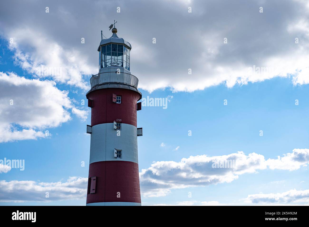 Famous Smeaton's Tower on the Hoe in Plymouth with blue sky background ...