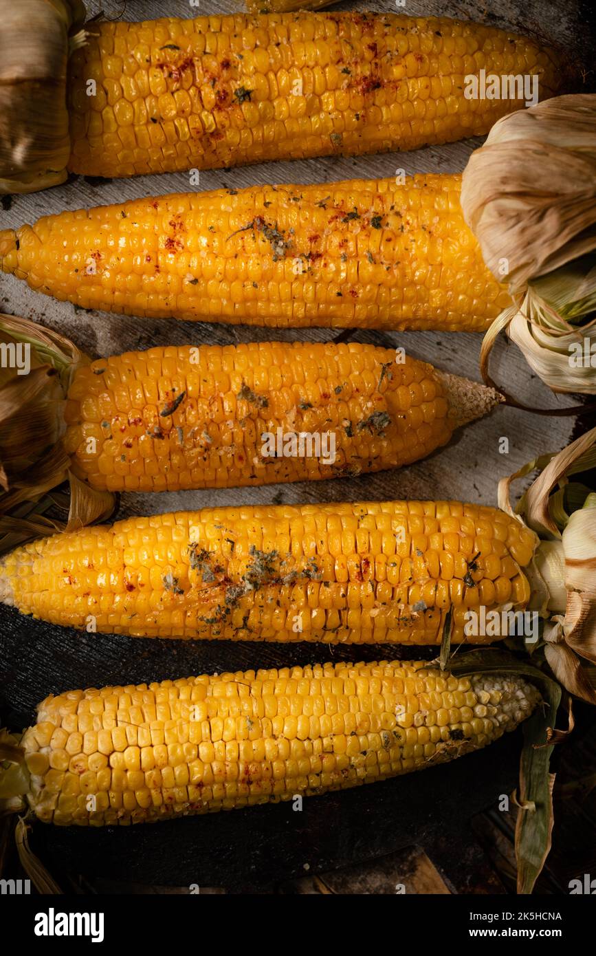 roasted corn with husks Stock Photo Alamy