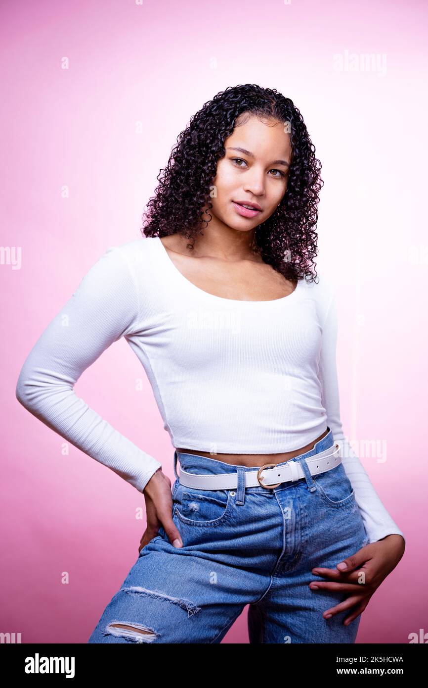 Headshot of a Young Black Actress on a Pink Background Stock Photo