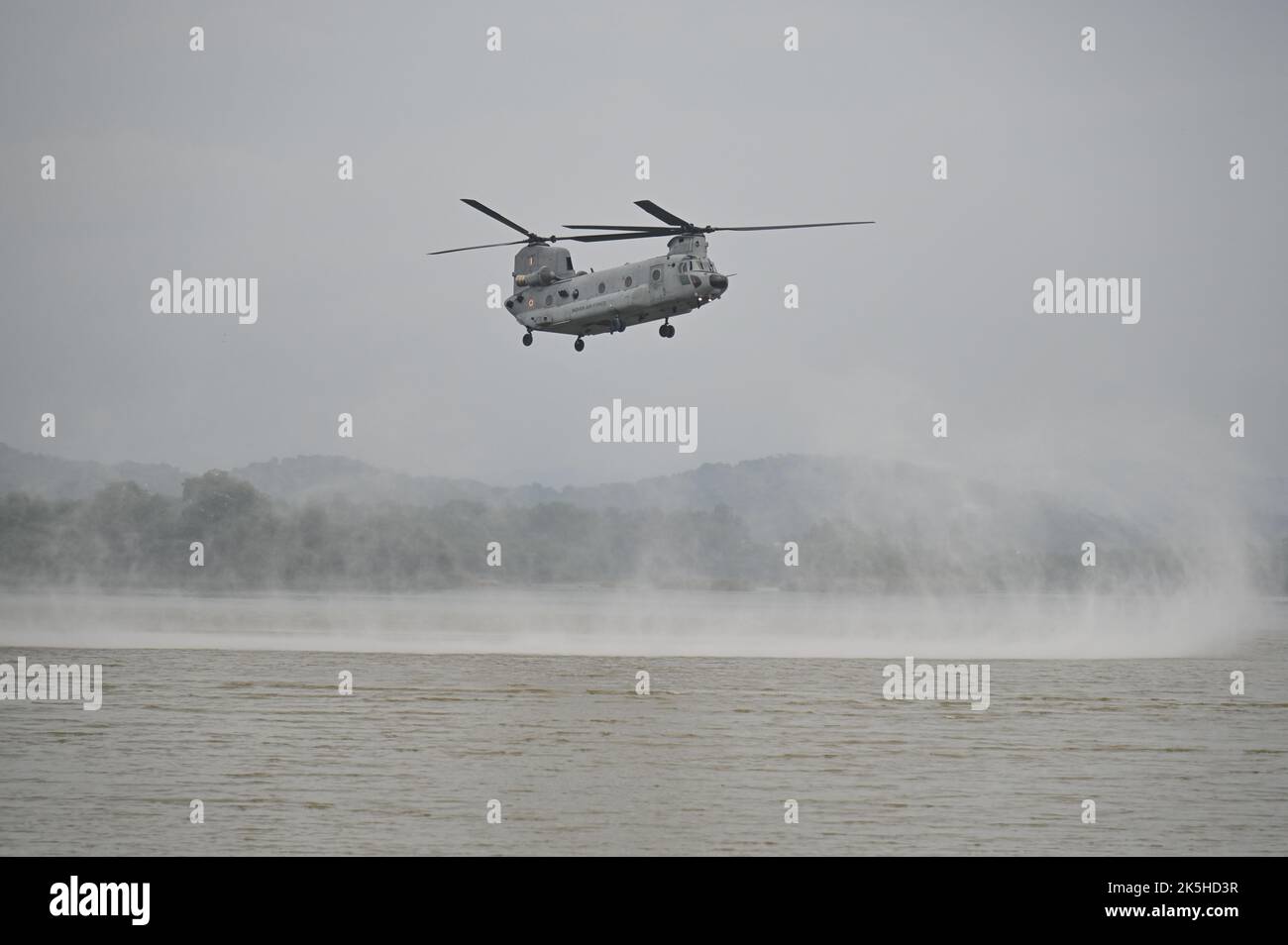Chandigarh, Delhi, India. 8th Oct, 2022. Indian Air Force's Chinook helicopter flies above a lake during the 90th Indian Airforce Day celebrations in Chandigarh. (Credit Image: © Kabir Jhangiani/ZUMA Press Wire) Stock Photo