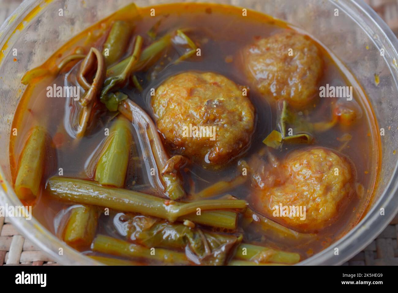 Myanmar traditional fish ball and water spinach soup recipe. Stock Photo