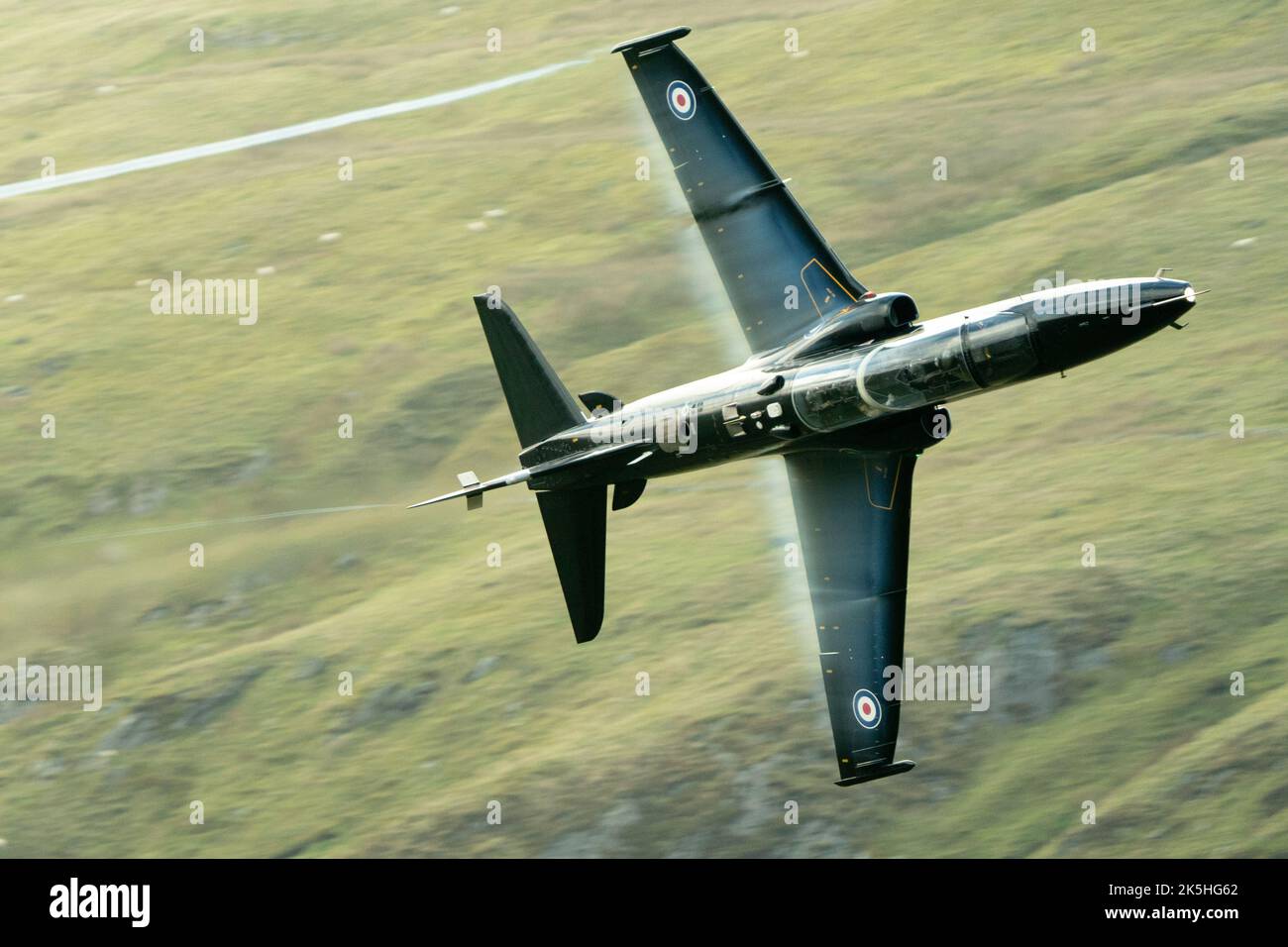 BAE hawk jet trainer flying low over Wales Stock Photo