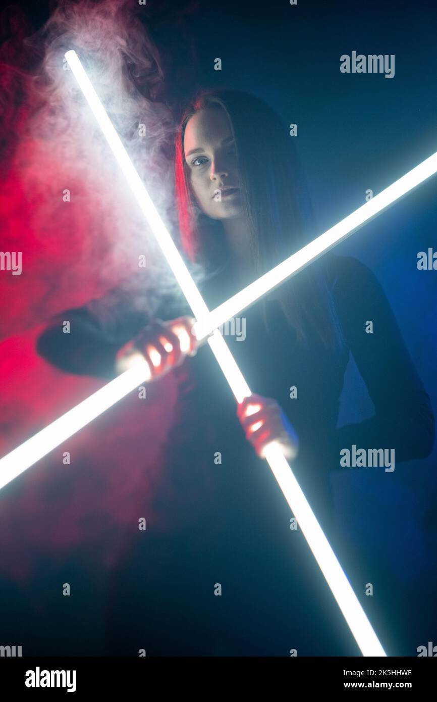 cyberpunk fighter galaxy war woman in neon steam Stock Photo