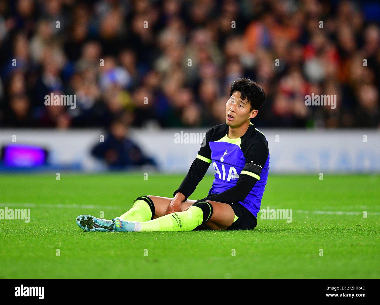 Brighton, UK. 08th Oct, 2022. Heung-Min Son of Tottenham Hotspur sits dismayed after missing out on scoring during the Premier League match between Brighton & Hove Albion and Tottenham Hotspur at The Amex on October 8th 2022 in Brighton, England. (Photo by Jeff Mood/phcimages.com) Credit: PHC Images/Alamy Live News Stock Photo