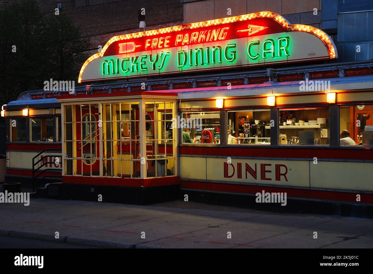 Mickey's Dining Car restaurant, a prefabricated Jerry O'Mahoney Diner, is illuminated with bright neon lights at night in St Paul, Minnesota Stock Photo