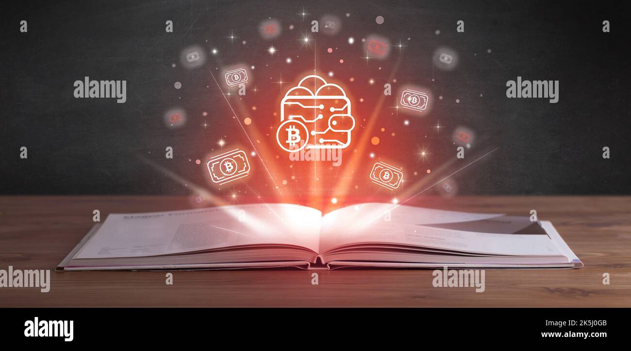 Open book with currency icons above Stock Photo - Alamy