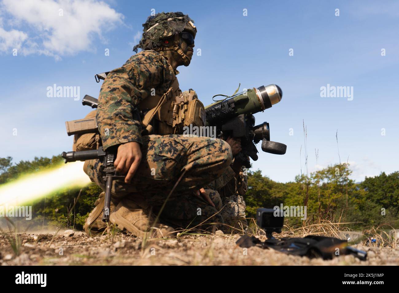 U.S. Marine Corps Lance Cpl. Amer Alamer (front) and Cpl. Chance Brown ...