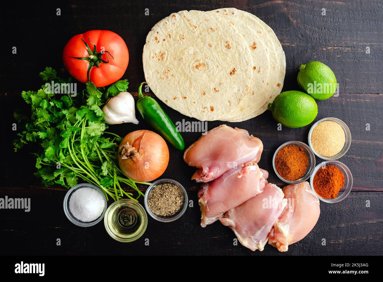 Raw Ingredients for Grilled Chicken Tacos with Toppings Chicken thighs