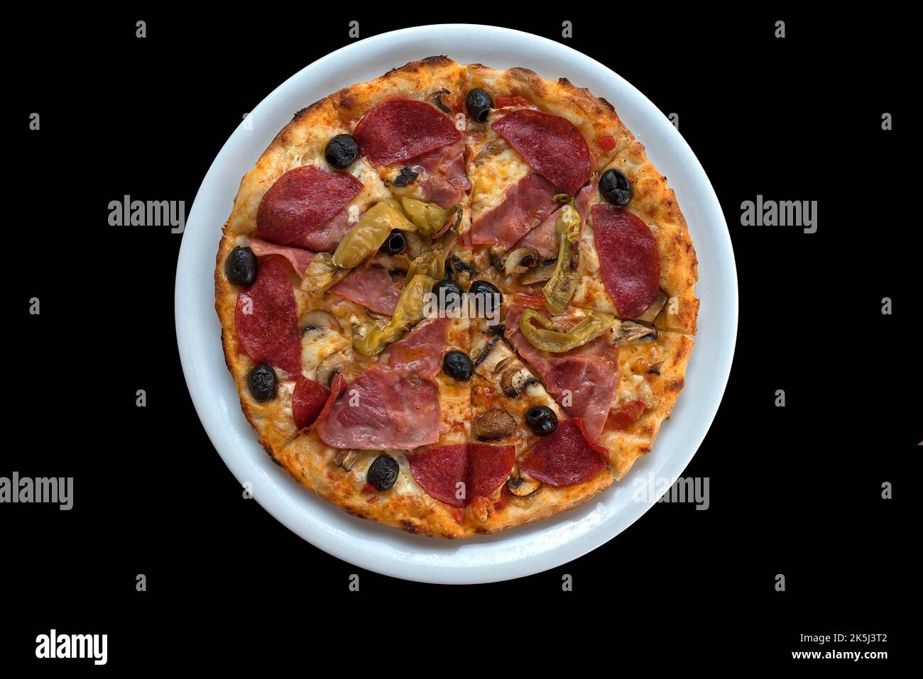 Pizza Salami on black background, Bavaria, Germany Stock Photo Alamy
