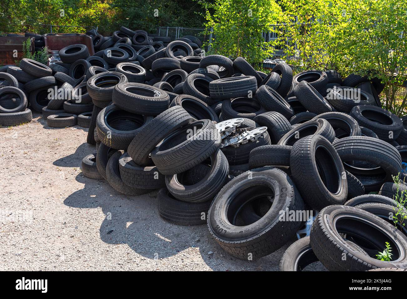 Collected car tyres on a scrap yard, Bavaria, Germany Stock Photo Alamy