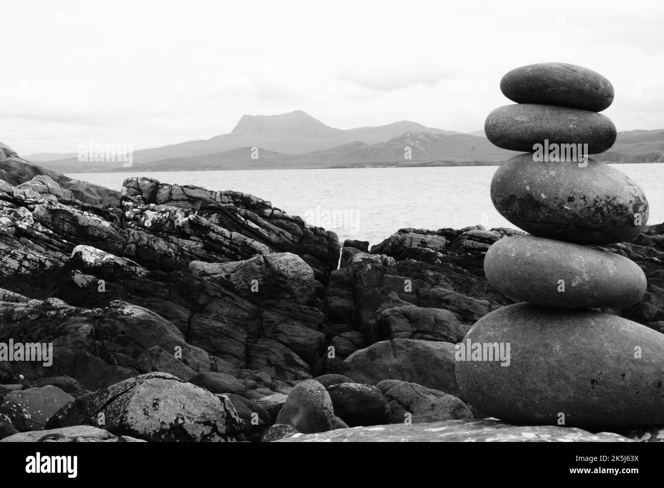 A grayscale shot of stones stacked on top of each other Stock Photo Alamy