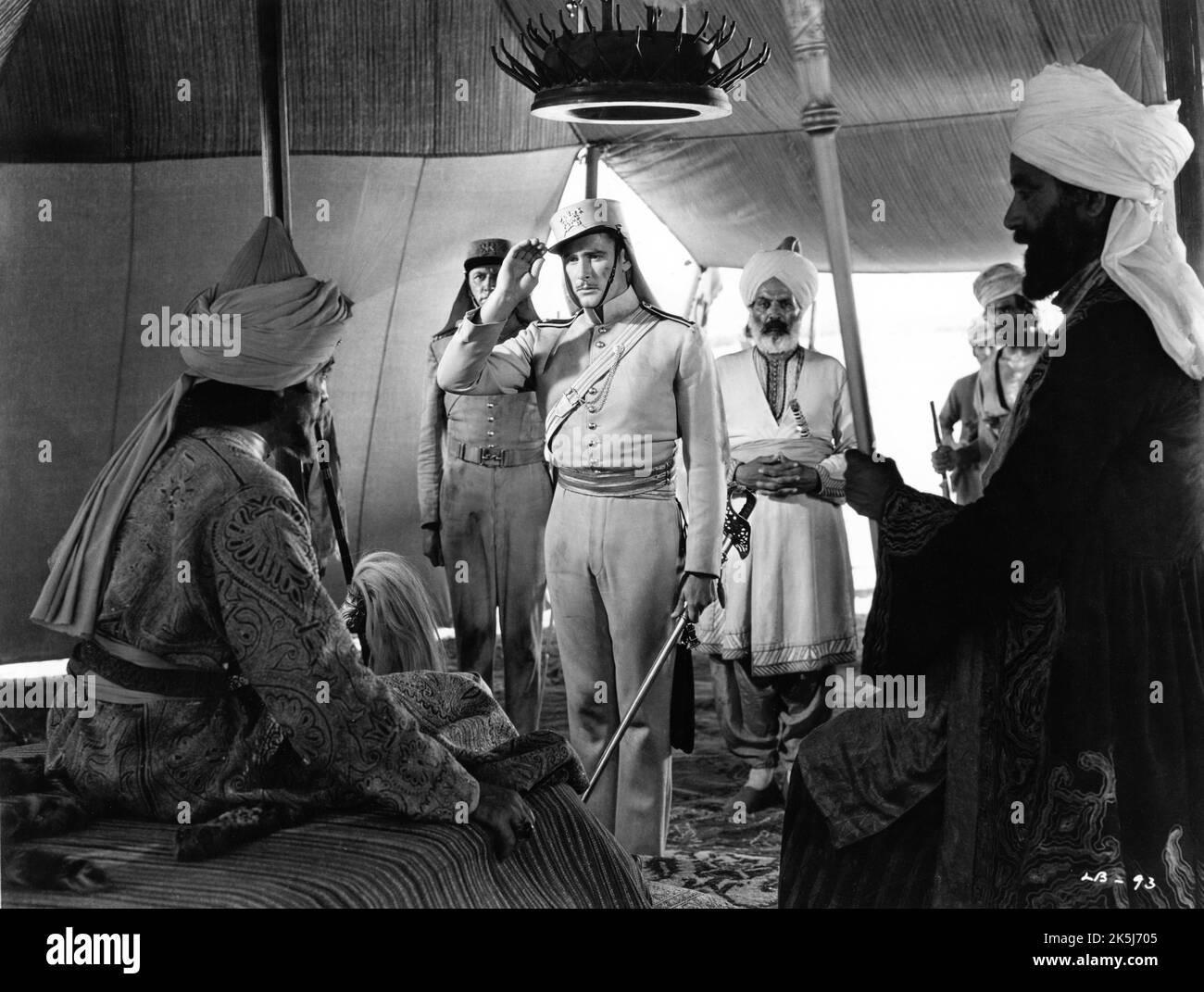 C. HENRY GORDON as Surat Khan and ERROL FLYNN as Major Geoffrey Vickers in THE CHARGE OF THE LIGHT BRIGADE 1936 director MICHAEL CURTIZ poem Alfred Lord Tennyson music Max Steiner Warner Bros. Stock Photo