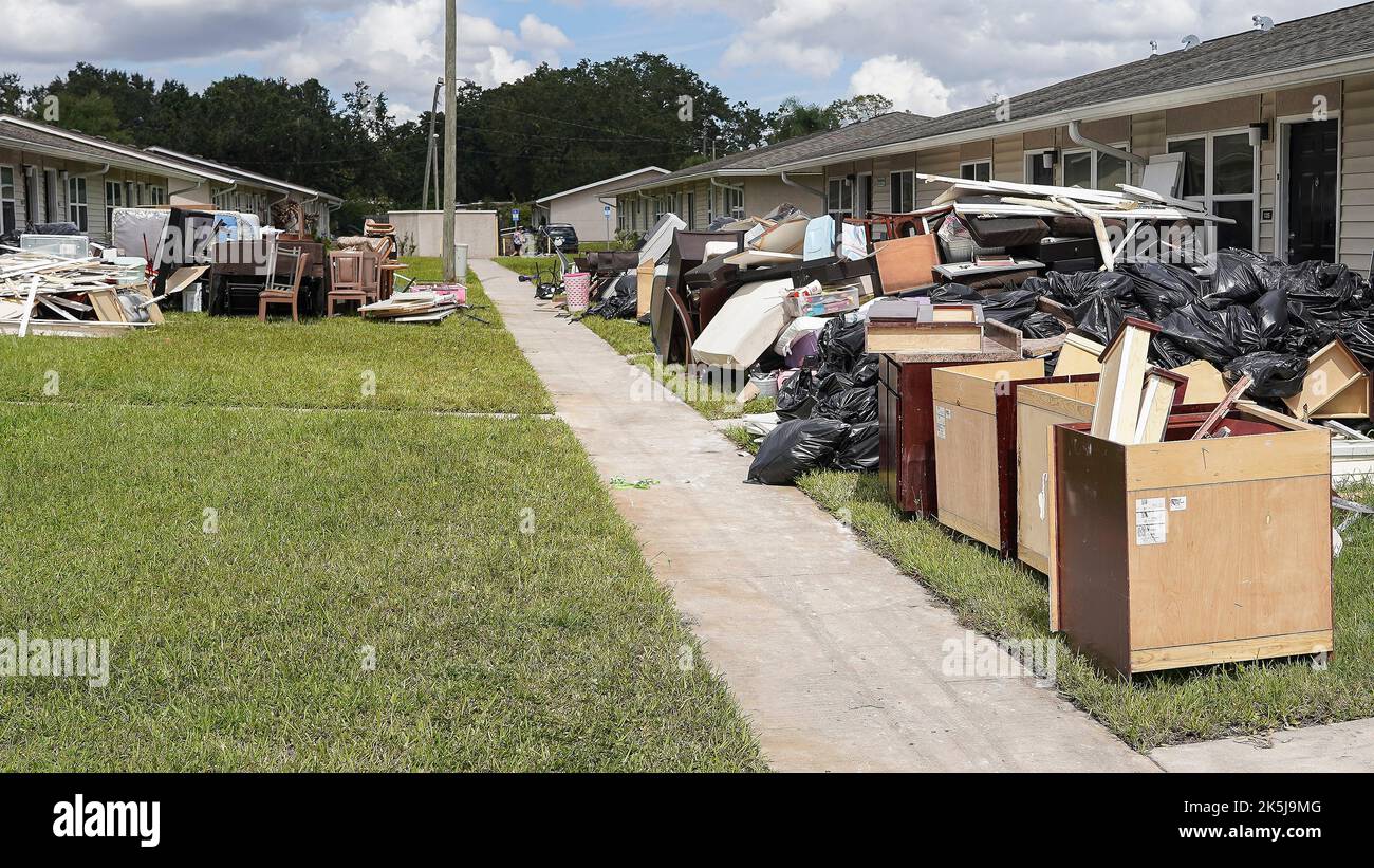 Kissimmee, United States. 04 October, 2022. Massive piles of debris after floodwaters destroyed