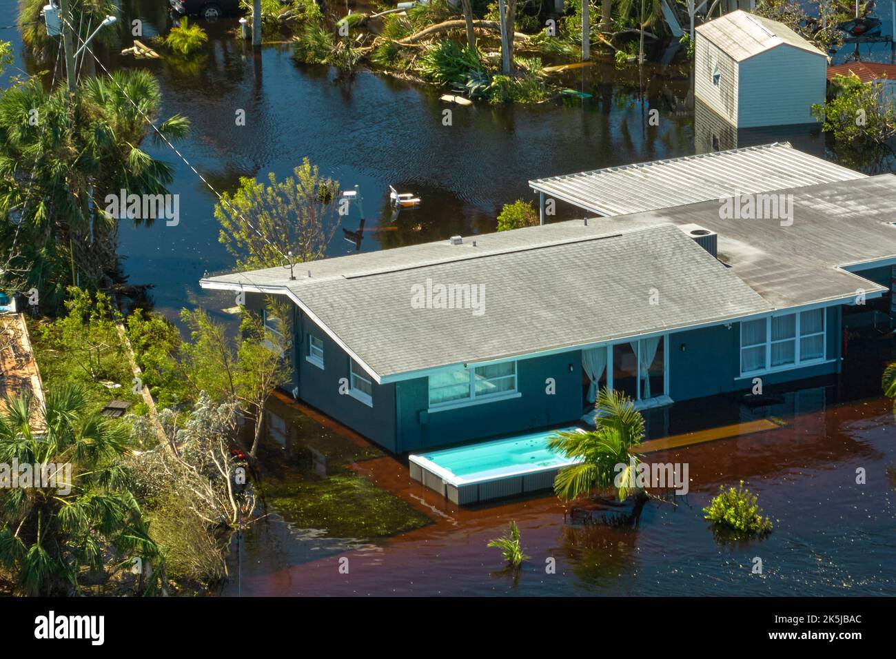 Flooded house by hurricane Ian rainfall in Florida residential area