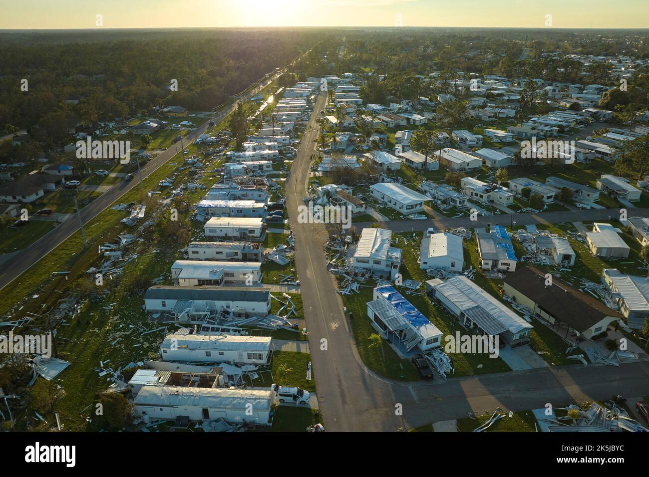 Badly damaged mobile homes after hurricane Ian in Florida residential