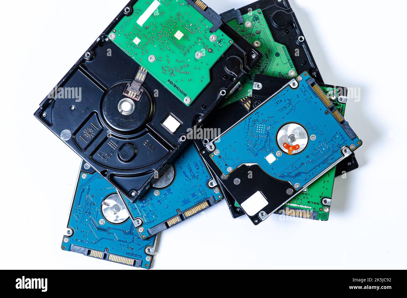 Hard disk drive HDD of different size isolated on white. Detailed view