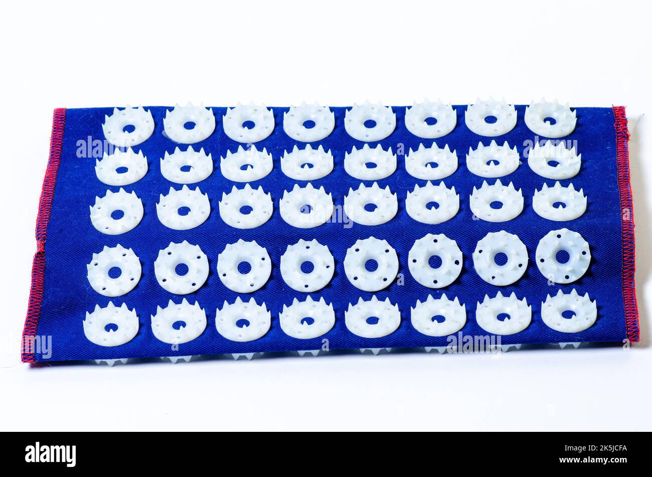 Massage mat with needles. Isolated on white background.Orthopedic
