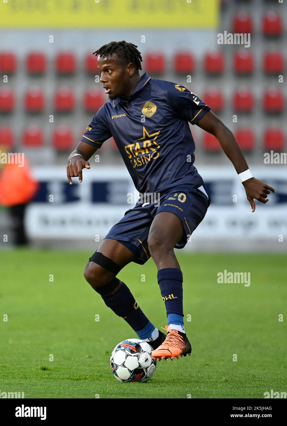 OHL's Hamza Mendyl fights for the ball during a soccer match between SV Zulte Waregem and OH Leuven, Saturday 08 October 2022 in Waregem, on day 11 of the 2022-2023 'Jupiler Pro League' first division of the Belgian championship. BELGA PHOTO JOHN THYS Stock Photo