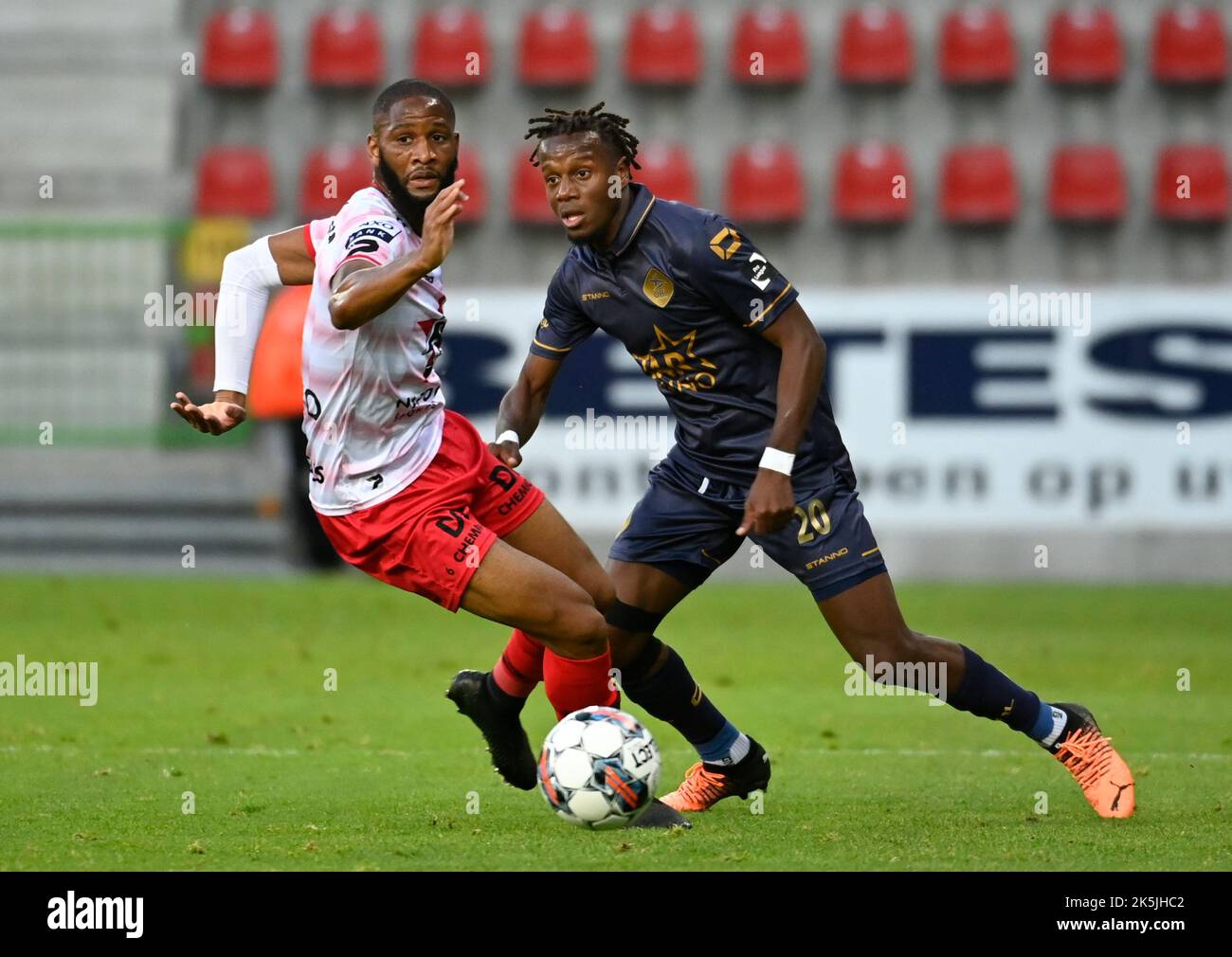 Essevee's Abdulaye Sissako and OHL's Hamza Mendyl fight for the ball during a soccer match between SV Zulte Waregem and OH Leuven, Saturday 08 October 2022 in Waregem, on day 11 of the 2022-2023 'Jupiler Pro League' first division of the Belgian championship. BELGA PHOTO JOHN THYS Stock Photo