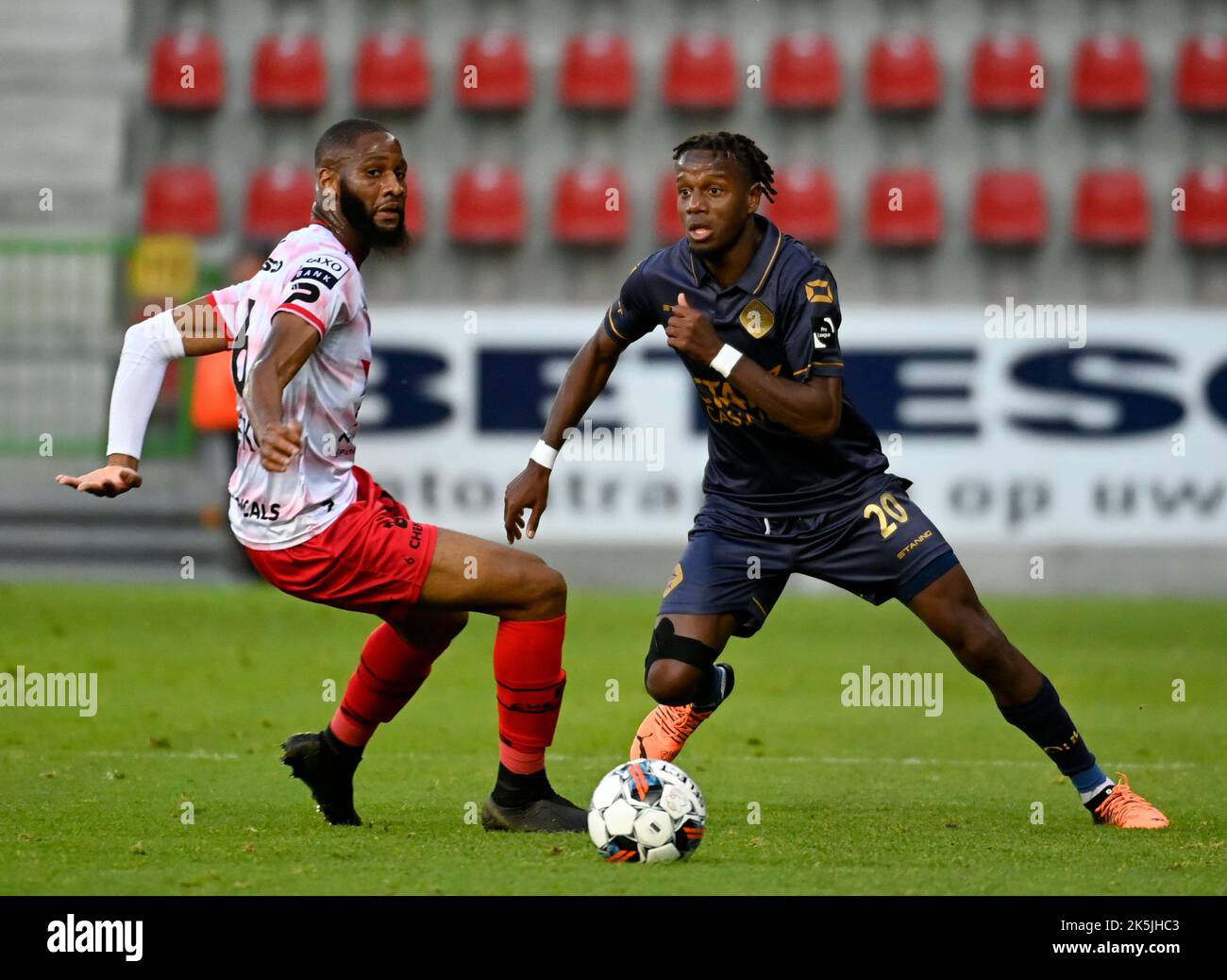Essevee's Abdulaye Sissako and OHL's Hamza Mendyl fight for the ball during a soccer match between SV Zulte Waregem and OH Leuven, Saturday 08 October 2022 in Waregem, on day 11 of the 2022-2023 'Jupiler Pro League' first division of the Belgian championship. BELGA PHOTO JOHN THYS Stock Photo