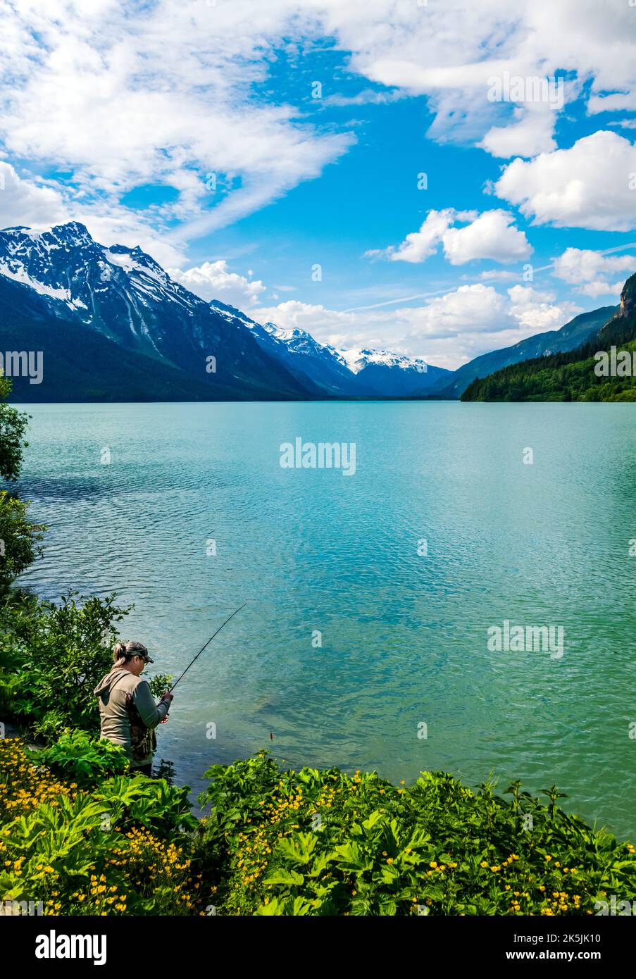 Female angler; Chilkoot Lake; Chilkoot State Recreation Site; Coast Mountains; Haines; Alaska; USA Stock Photo