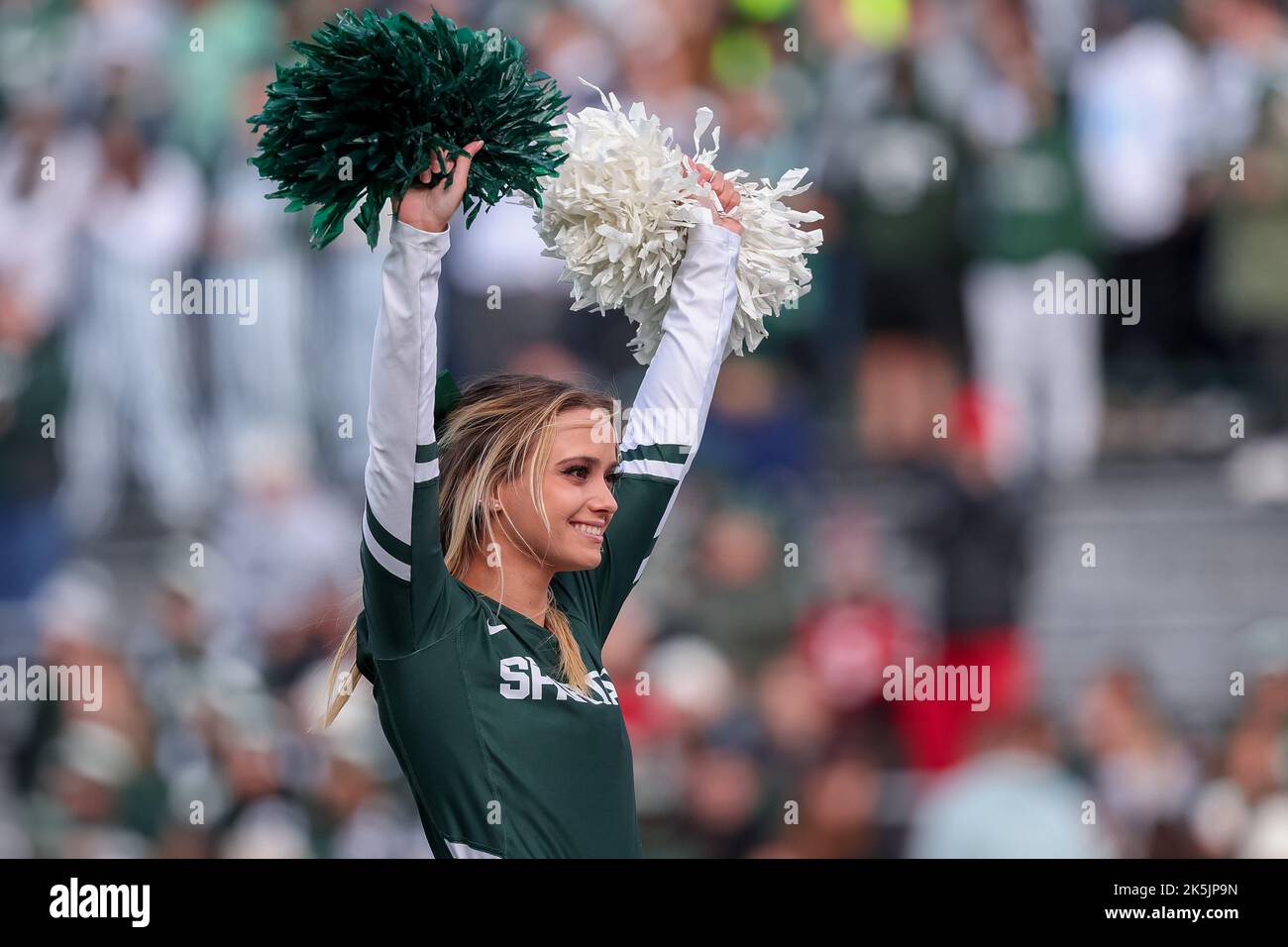 East Lansing, Michigan, USA. 8th Oct, 2022. Michigan State Spartans cheerleader during the game between the Ohio State Buckeyes and Michigan State Spartans at Spartan Stadium, East Lansing, Michigan. (Credit Image: © Scott Stuart/ZUMA Press Wire) Stock Photo